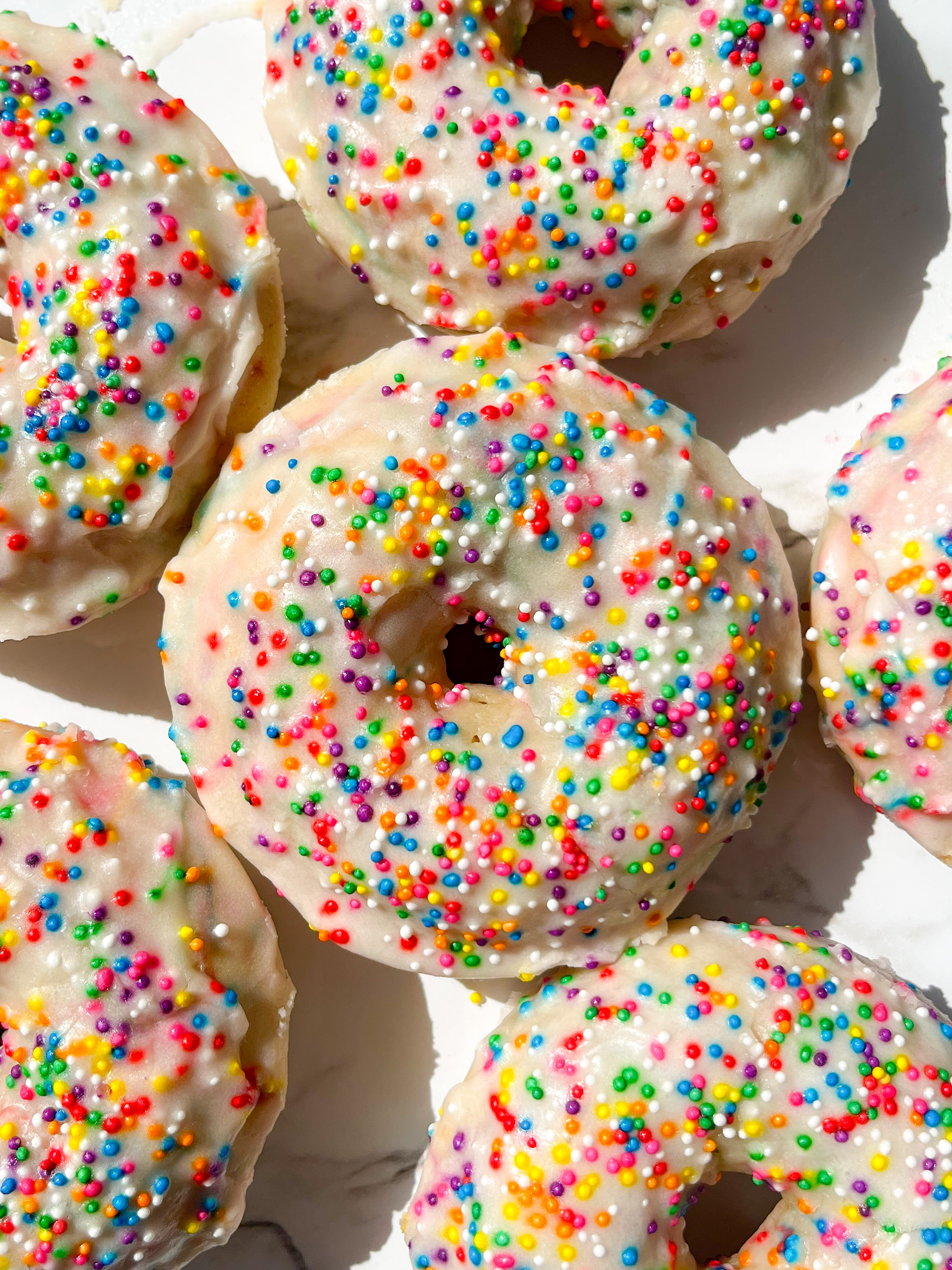 Sprinkle baked donuts